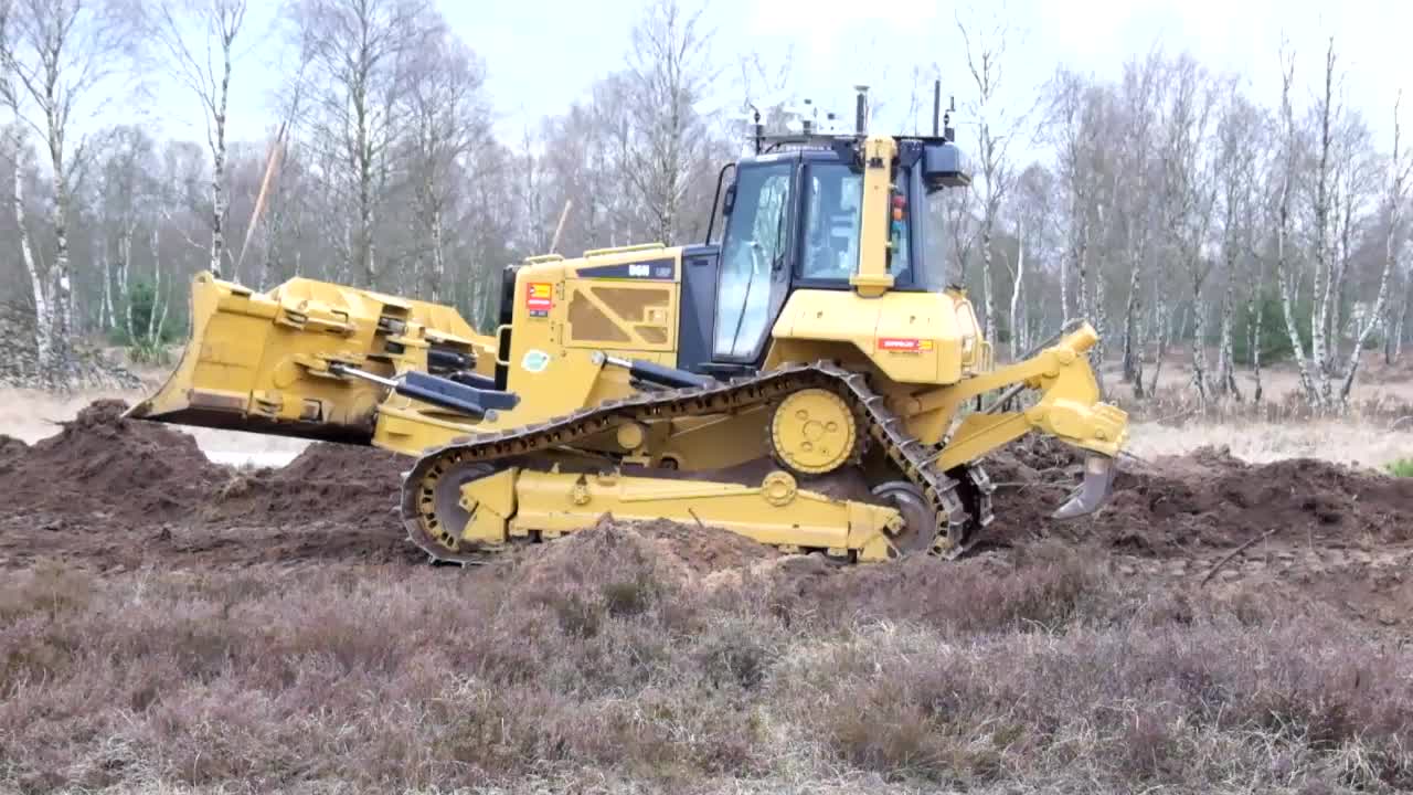 Camera-equipped bulldozer at the clearance site